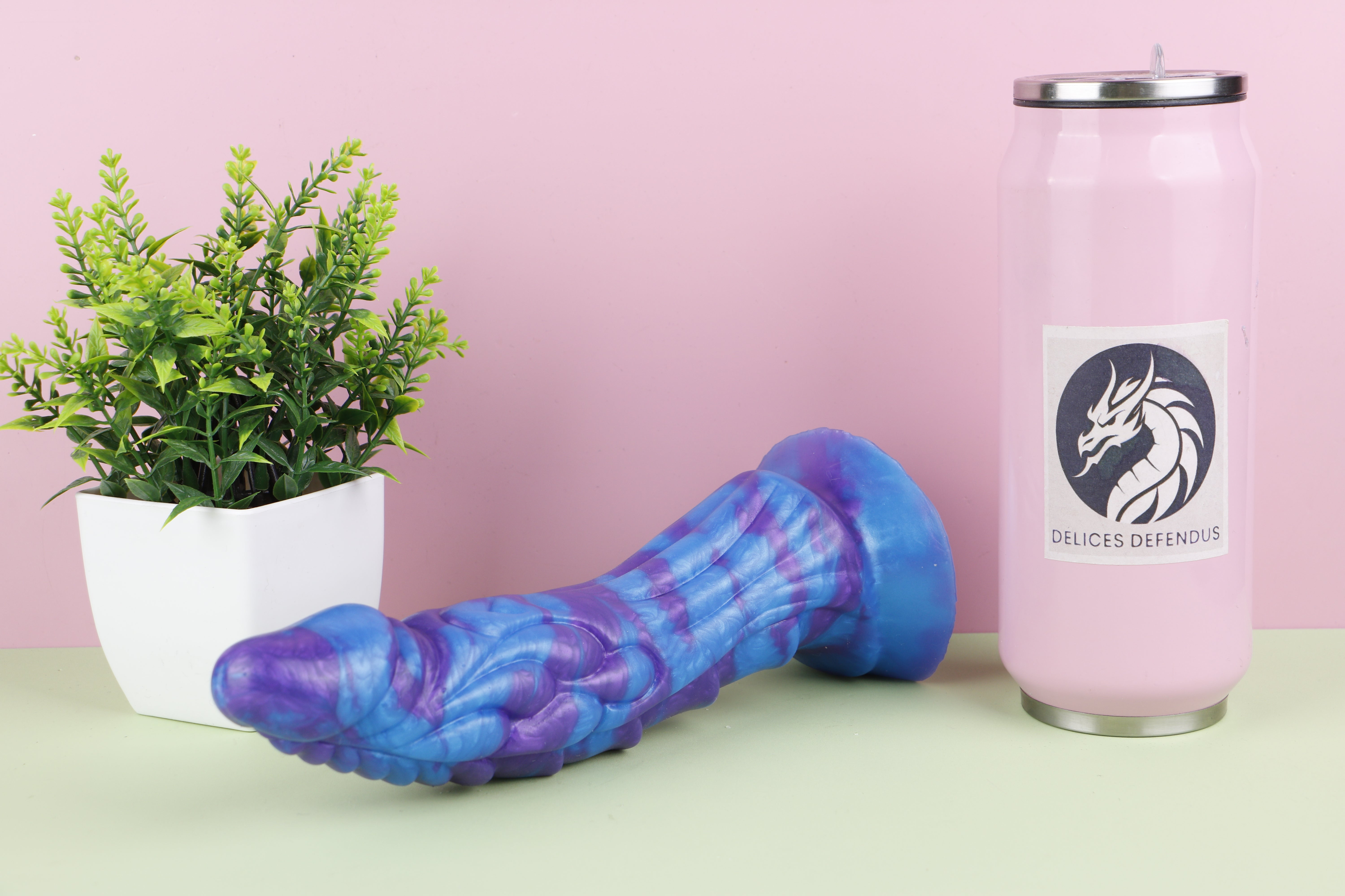 Dragon furry dildo made from body-safe platinum silicone with detailed fantasy scales and knot design.