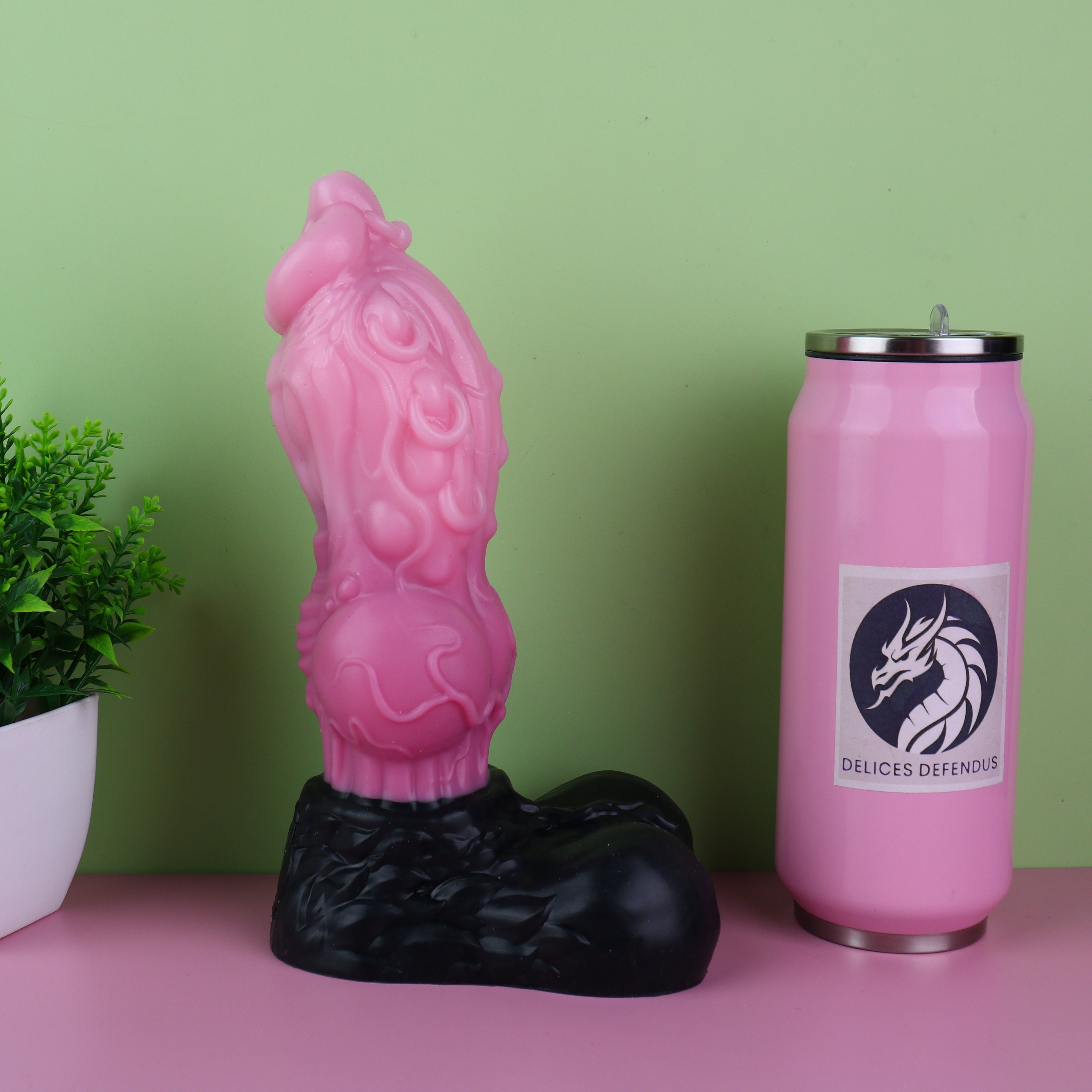 Close-up of Loona from Helluva Boss futa dildo featuring detailed piercings on pink shaft and massive inflating knot for intense lock-in sensation platinum cure silicone