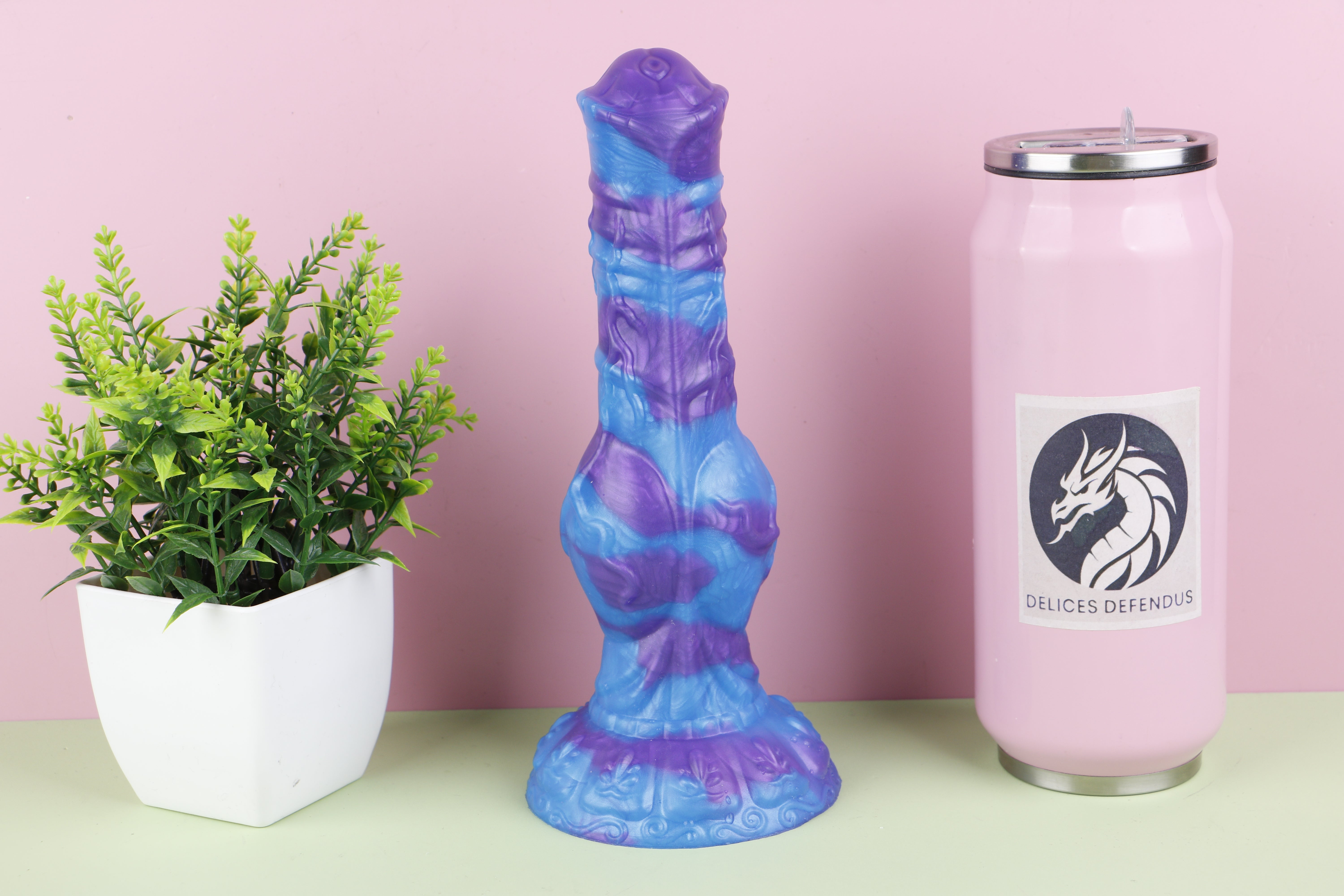 Mythical creature knot dildo featuring fantasy-inspired details and premium platinum silicone construction.